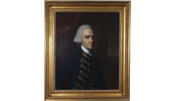 gold framed portrait of John Hancock, a man with gray hair and a blue overcoat