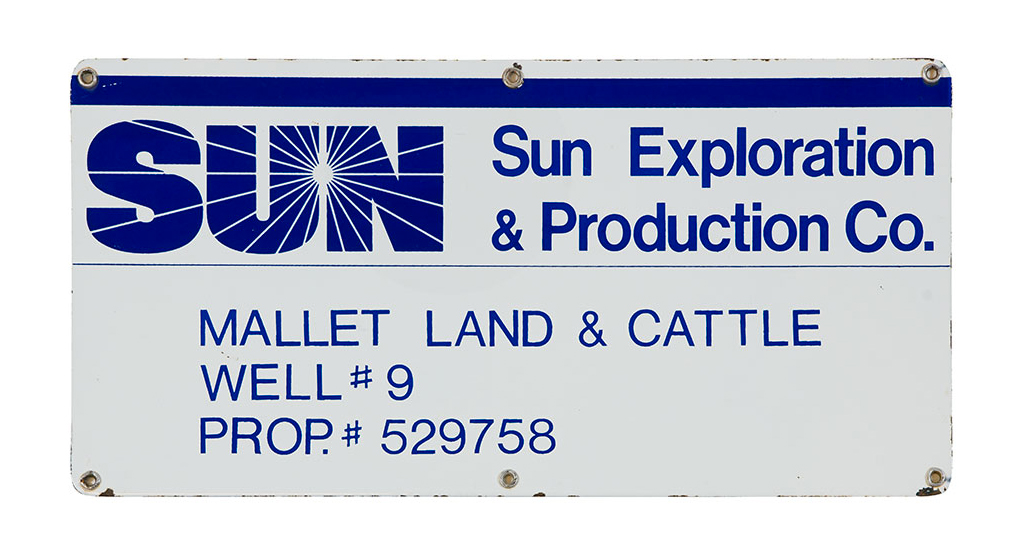 Metal sign for oil lease by the Sun Exploration and Production Company from the Mallet Ranch in West Texas