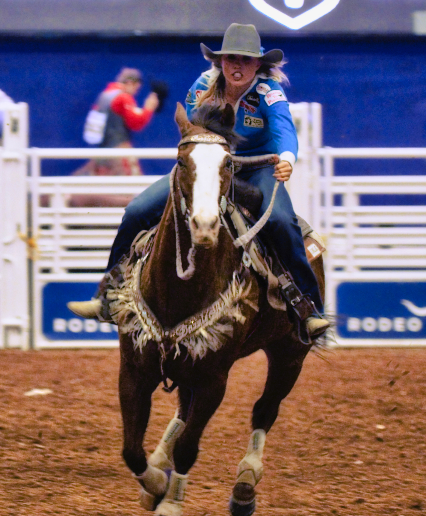 A barrel racer competes at Rodeo Austin in 2017. Original video documentaries throughout the exhibition capture the excitement of rodeo events across the state.