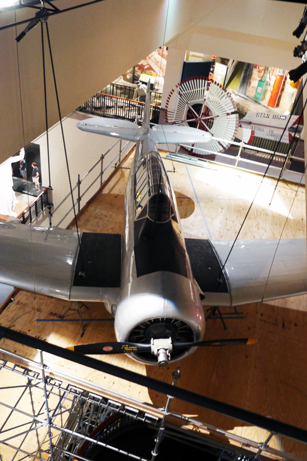 The Bullock Texas State History Museum's AT-6A WWII "Texan" aircraft took flight this week above the Museum's three-storied exhibition atrium. 