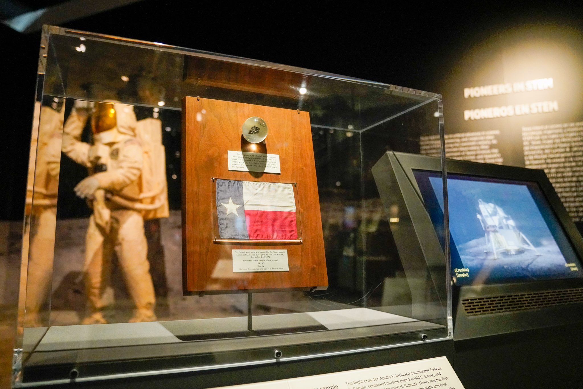 Artifacts from third floor of Museum's Texas History Galleries include a lunar rock sample and moon landing diorama