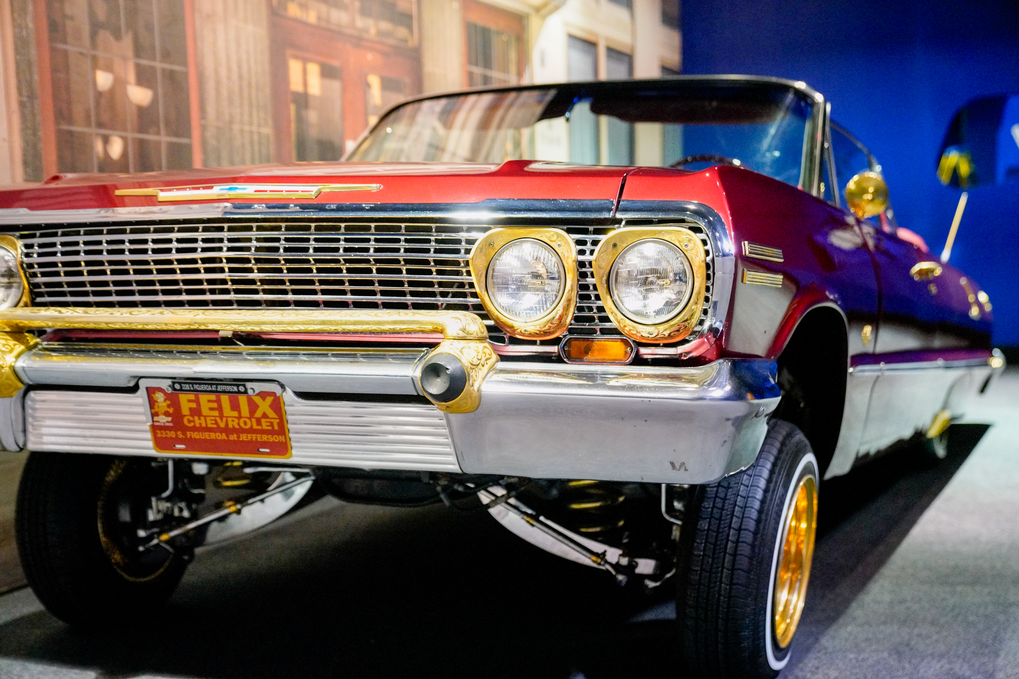 ​​Carros y Cultura exhibition features lowrider cars and bicycles highlighting the rich culture of the Texas lowriding community. 1963 Chevy Impala courtesy Raul Rodriguez Jr., Round Rock