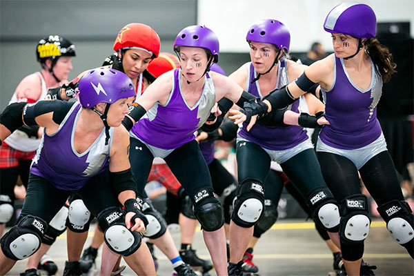 Examine contemporary popular culture and the role of women in contact sports through historical photographs, personal stories, and artifacts in the Roller Derby exhibition. 