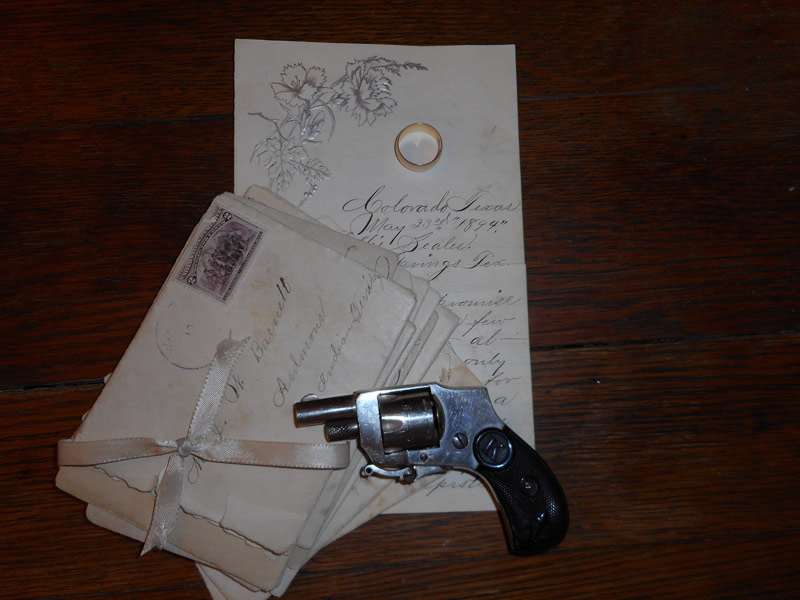 Gold band, gun and letters belonging to Lillie Mae Seales