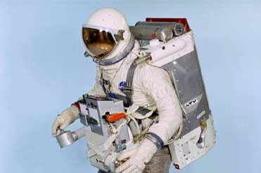 white astronaut suit with helmet and hoses connected to a jet pack (astronaut maneuvering unit)