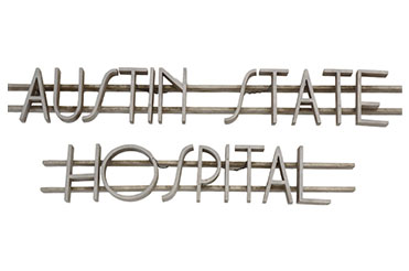 metal letter sign that reads Austin State Hospital