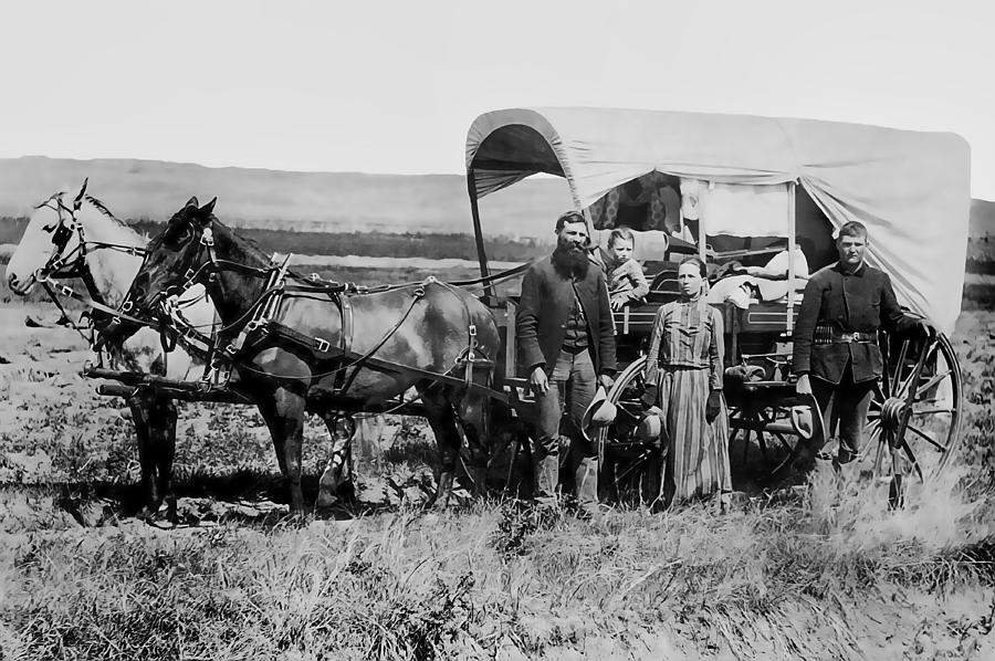 Immigrant family with wagon