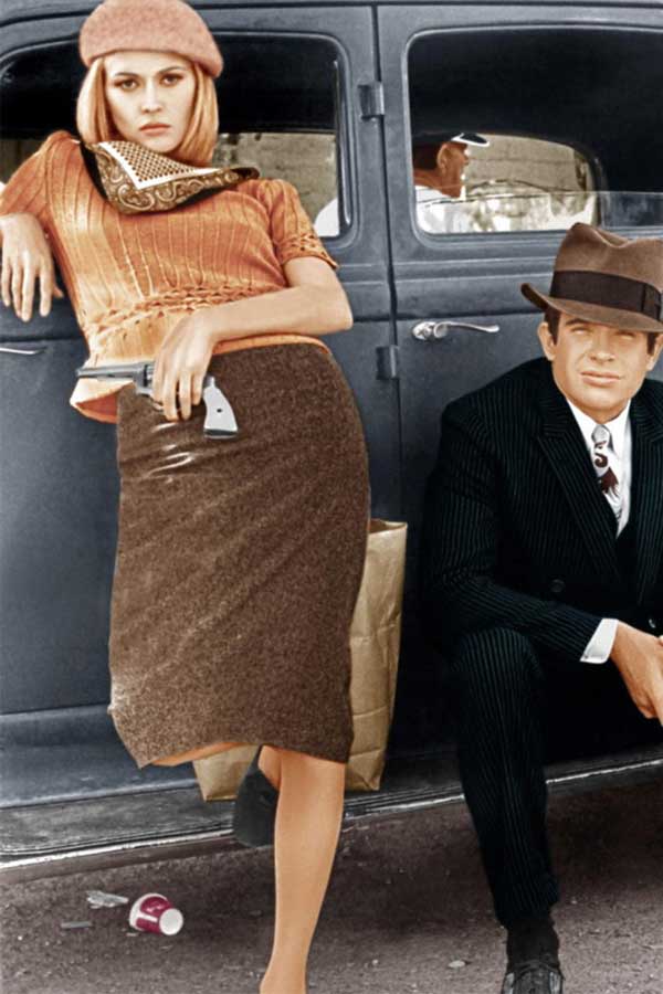 Bonnie and Clyde posing in front of a car, 1967