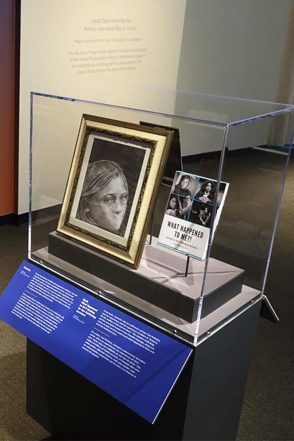 pencil drawing portrait of a woman with her mouth erased by sex trafficking survivor Allison Franklin, on display in the Bullock Museum exhibition Not Alone