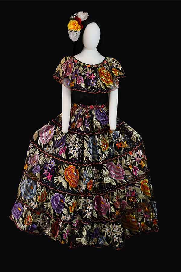 black vibrant fiesta gown with colorful flowers from the state of Chiapas
