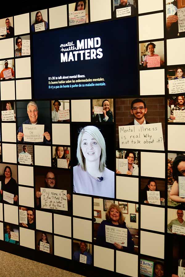 grid of many photos of people talking in the exhibit Mental Health: Mind Matters