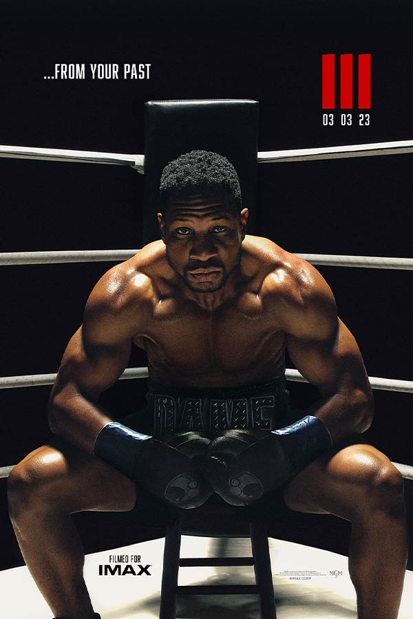 film poster for "Creed III" of a Black man sitting in a boxing ring, looking directly in the camera lens