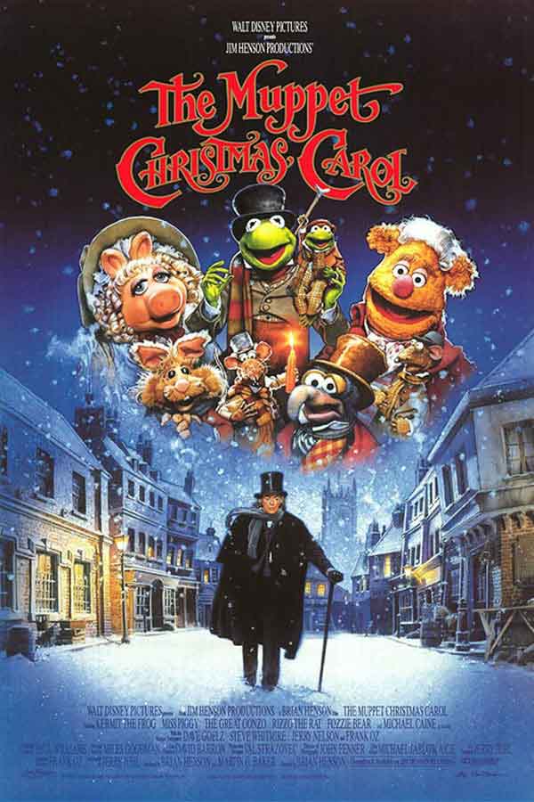 poster from the film "Muppet Christmas Carol" of Muppet characters in the sky and a tall dark man walking down a snowy street