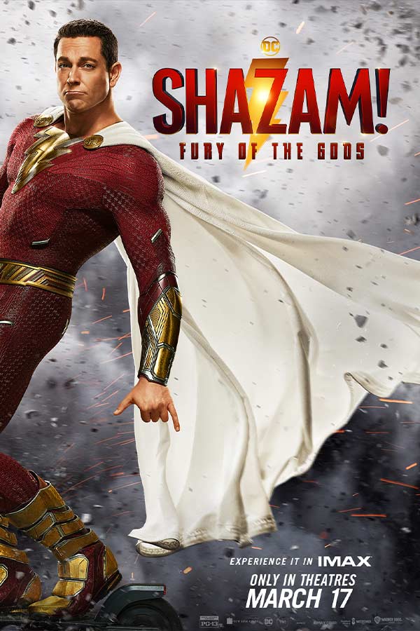 film poster for "Shazam! Fury of the Gods" of a man wearing a red body suit and white cape billowing behind him 