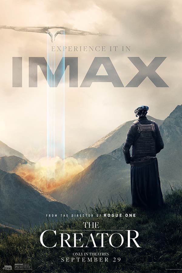 film poster for "The Creator" of a machine alien creature in black standing in a beautiful landscape with an alien ship in the sky