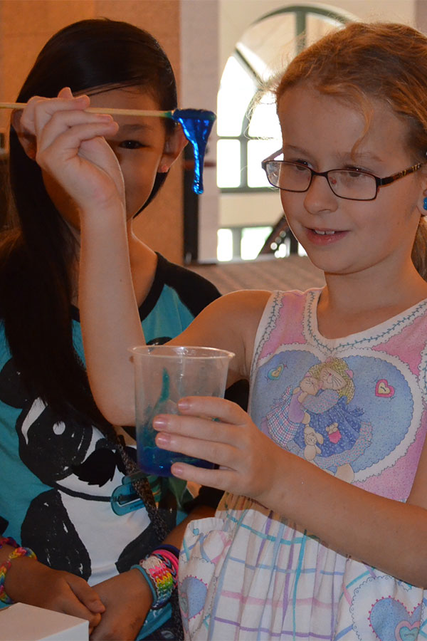 students make slime at science thursday