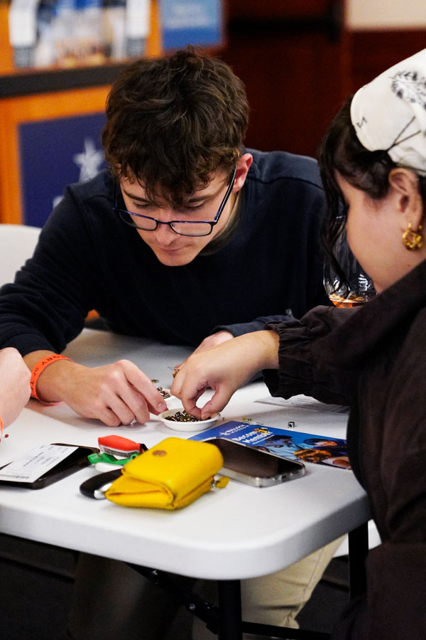 Two young people doing a craft