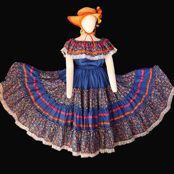 Sinaloa dress with fanned skirt that has a floral pattern and a blue and red band across the center