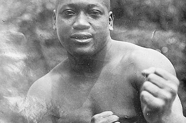 Picture of African American man boxer with fists raised