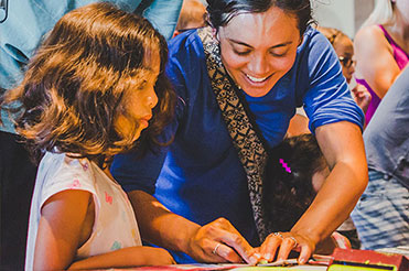 woman and child doing a craft at the Bullock Museum