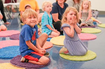 children listening to a storytime at the Bullock Museum.