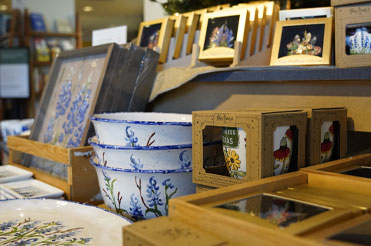 blue and white ceramic bowls on display in the Bullock Museum Store