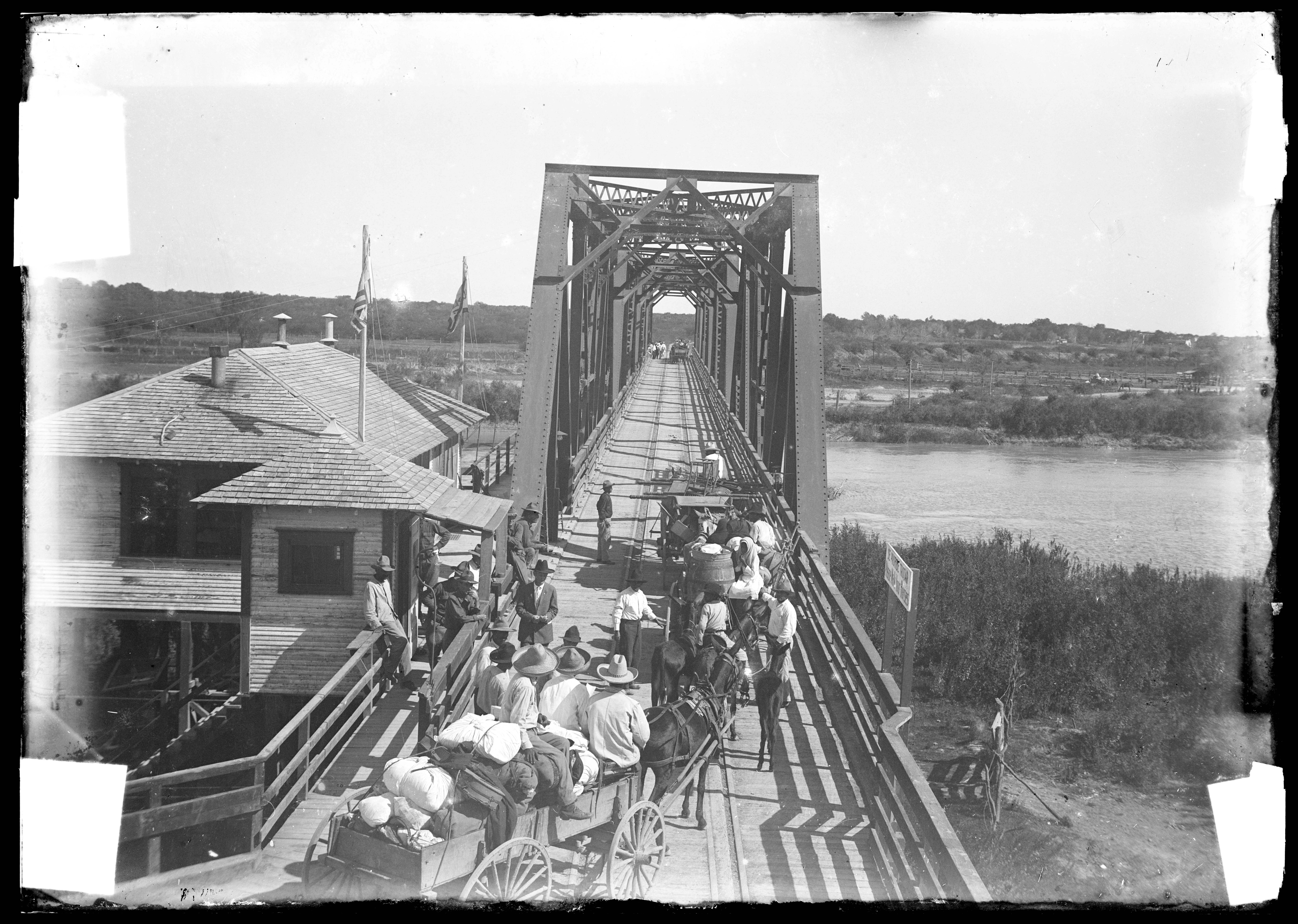 Refugees flee to Mexico to escape violence along the Texas-Mexico border in this early 20th-century photograph. Image courtesy of the Robert Runyon Photograph Collection, The Dolph Briscoe Center for American History, The University of Texas at Austin.